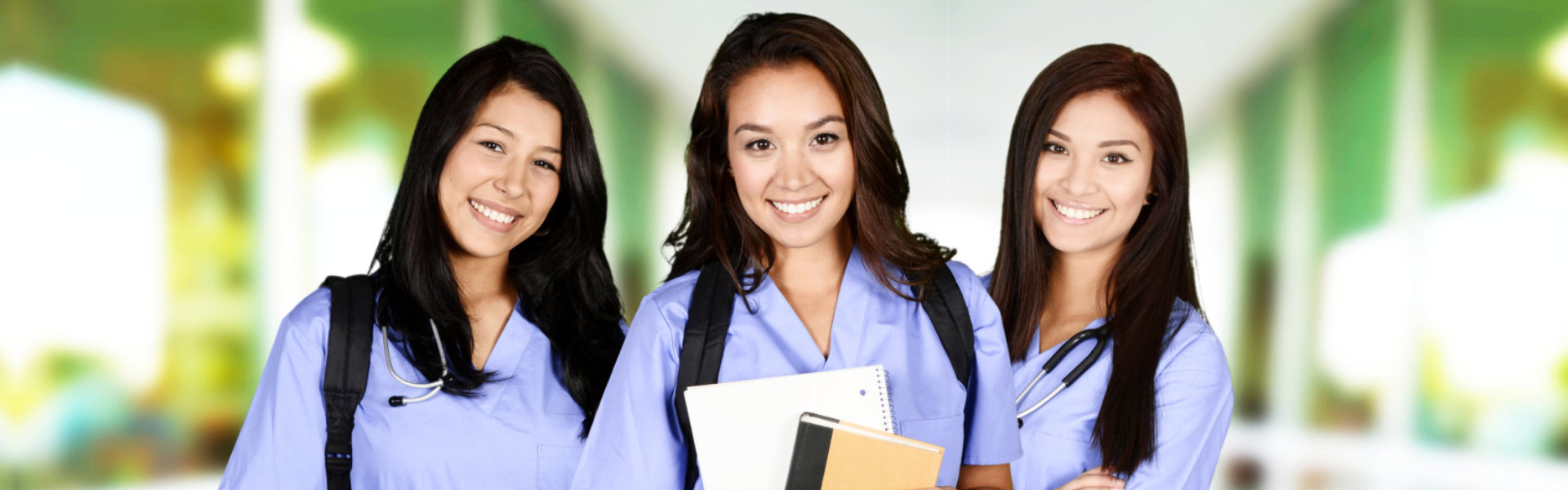 three nurse smiling at the camera